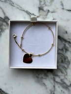 Pulsera de punto dije corazón dorado personalizable