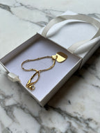 Pulsera corazón grosor fino acero dorado personalizable